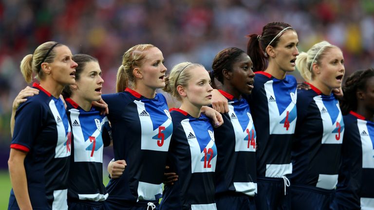 LONDON, ENGLAND - JULY 31:  Team GB players sing the national anthem before the Women's Football first round Group E Match between Great Britain and Brazil