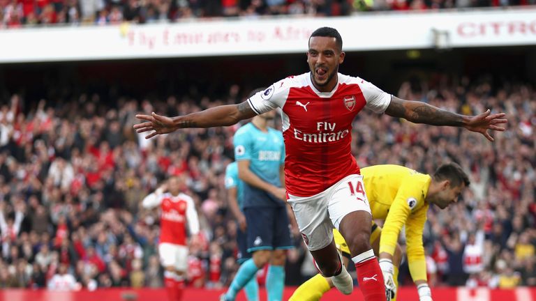 Theo Walcott of Arsenal celebrates after scoring