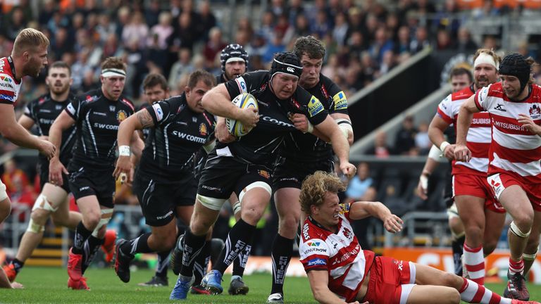 Thomas Waldrom of Exeter charges forward for the Chiefs' first try against Gloucester