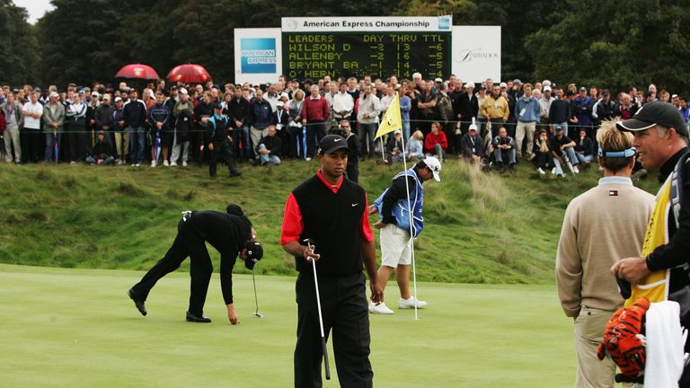 WATFORD, UNITED KINGDOM - OCTOBER 01:  Tiger Woods of USA walks off the 8th green as play is suspended due to a weather warning during the final round of t