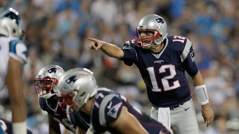 CHARLOTTE, NC - AUGUST 26:   Tom Brady #12 of the New England Patriots makes a call at the line of scrimmage against the Carolina Panthers in the 2nd quart