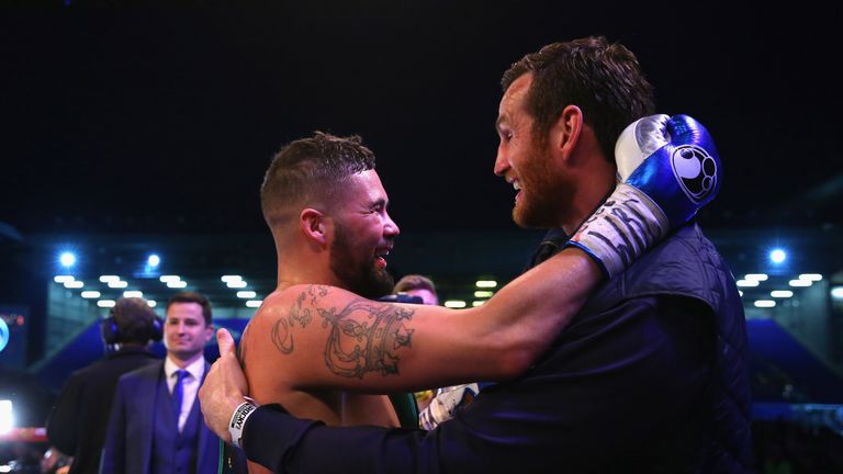 Tony Bellew celebrates with David Price after stopping Illunga Makabu in the second round to win the Vacant WBC World Cruiser