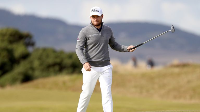 ST ANDREWS, SCOTLAND - OCTOBER 09:  Tyrrell Hatton of England reacts after holing a putt on the fourth green during the final round of the Alfred Dunhill L