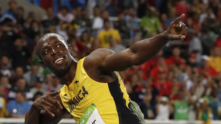 Jamaica's Usain Bolt does his "Lightening Bolt" pose after he won the Men's 200m Final during the athletics event at the Rio 2016 Olympic Games at the Olym