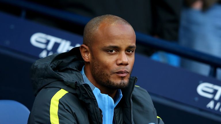 MANCHESTER, ENGLAND - OCTOBER 15: Vincent Kompany of Manchester City takes his seat on the bench during the Premier League match between Manchester City an