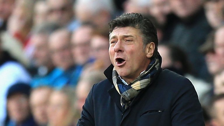 SWANSEA, WALES - OCTOBER 22: Walter Mazzarri, Manager of Watford reacts  during the Premier League match between Swansea City and Watford at the Liberty St