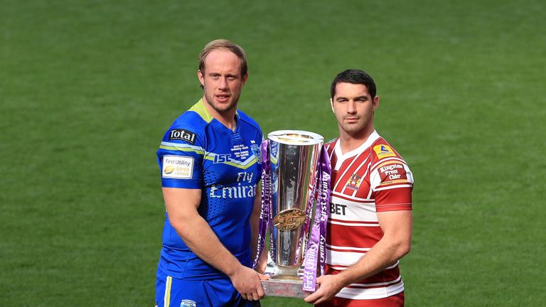 Warrington Wolves' Chris Hill (left) and Wigan Warriors' Matty Smith pose with the Super League trophy