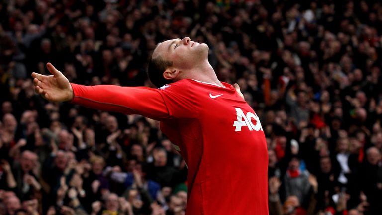 MANCHESTER, ENGLAND - FEBRUARY 12:  Wayne Rooney of Manchester United celebrates after he scores a goal from an overhead kick during the Barclays Premier L