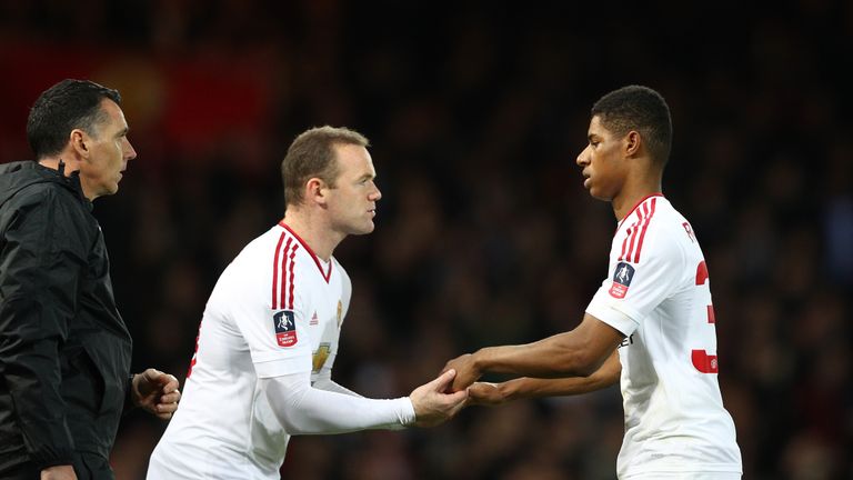 Wayne Rooney of Manchester United comes on as a substitute for Marcus Rashford