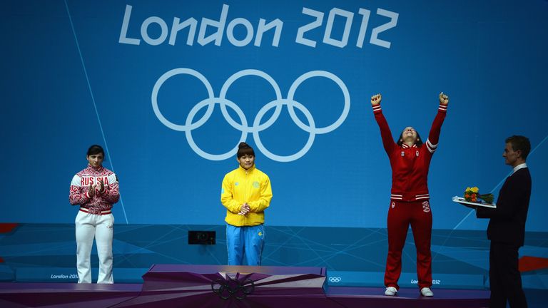 Christine Girard  (right) stands to win silver from London 2012 Games