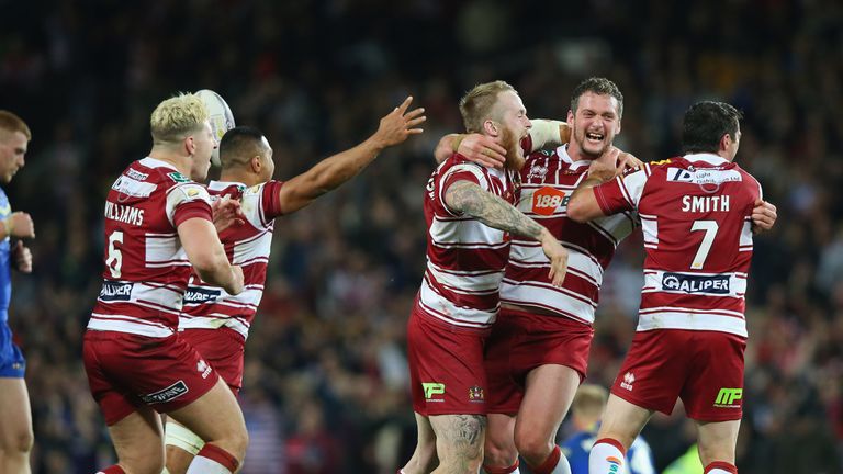 MANCHESTER, ENGLAND - OCTOBER 08:  The players of Wigan Warriors celebrate victory in the First Utility Super League Final between Warrington Wolves and Wi