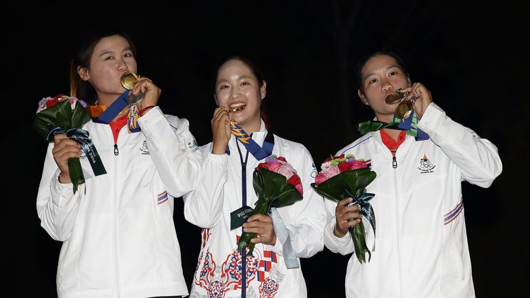 Sangchan (right)won bronze in the women's individual round 4 on day nine of the 2014 Asian Games