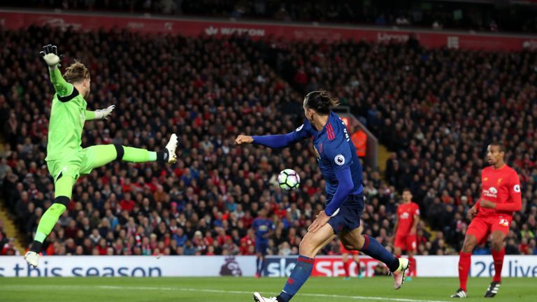 Manchester United's Zlatan Ibrahimovic (right) heads across goals