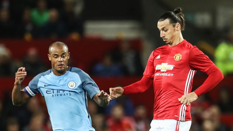 Zlatan Ibrahimovic and Vincent Kompany in action during the EFL Cup 4th Round