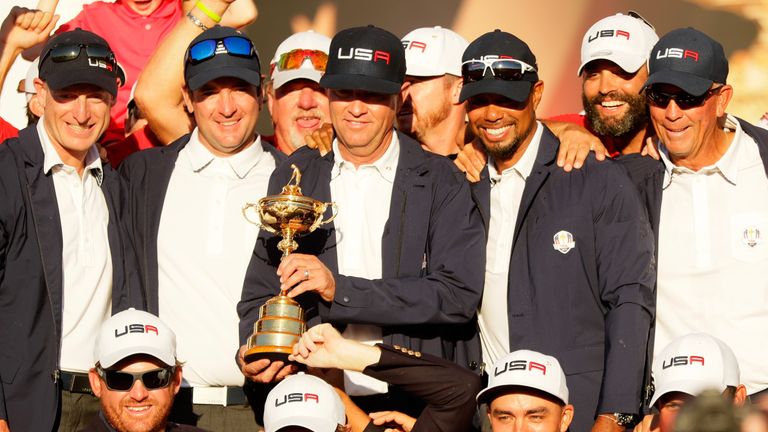 CHASKA, MN - OCTOBER 02: Captain Davis Love III of the United States celebrates with vice-captains Jim Furyk, Bubba Watson, Tiger Woods and Tom Lehman duri