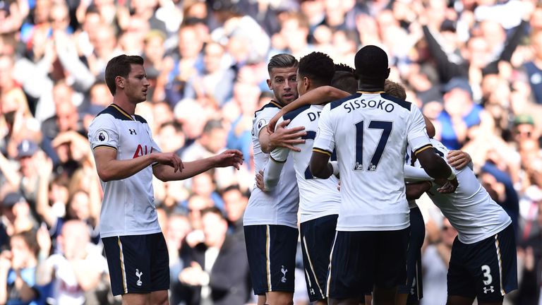 Tottenham's players celebrate taking the lead at White Hart Lane