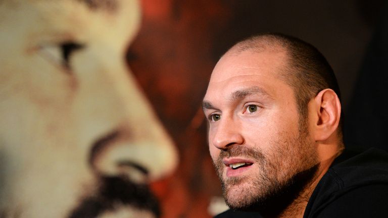 Tyson Fury speaks during a press conference ahead of his heavyweight title fight against Wladimir Klitschko