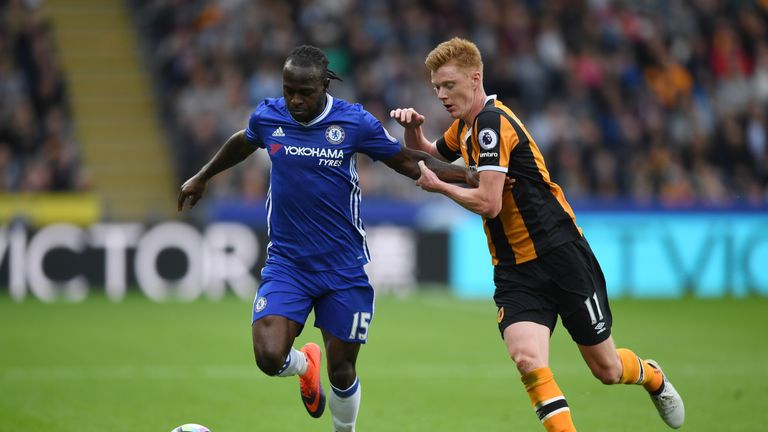 Victor Moses holds off Sam Clucas during Chelsea's win at Hull