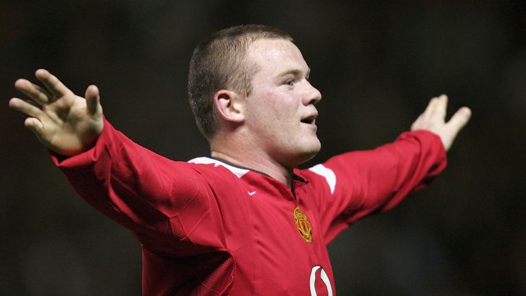 Wayne Rooney celebrates one of his three goals on his Manchester United debut against Fenerbahce