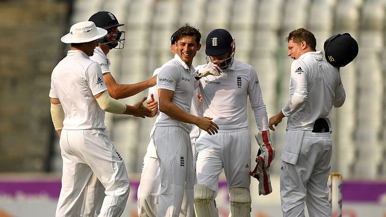 Zafar Ansari of England celebrates with teammates after dismissing Tamim Iqbal of Bangladesh  during the second day of the 2nd Test