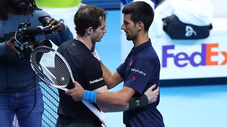 Champion Andy Murray of Great Britain is congratulated by Novak Djokovic of Serbia, ATP World Tour Finals