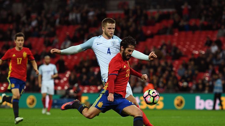 LONDON, ENGLAND - NOVEMBER 15:  Isco of Spain beats Eric Dier of England to score their second and equalising goal during the international friendly match 