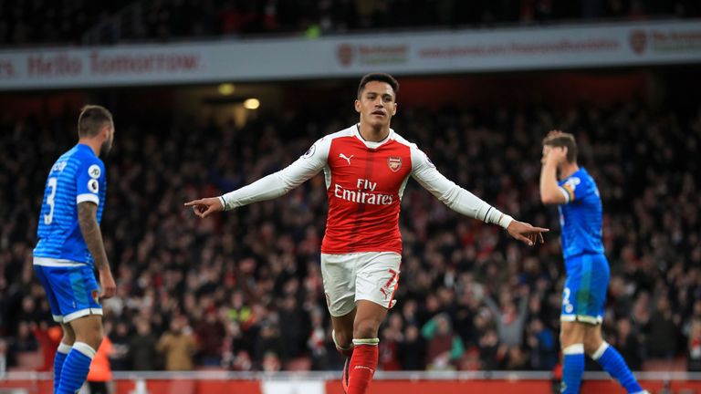 Arsenal's Alexis Sanchez celebrates scoring his side's third goal 