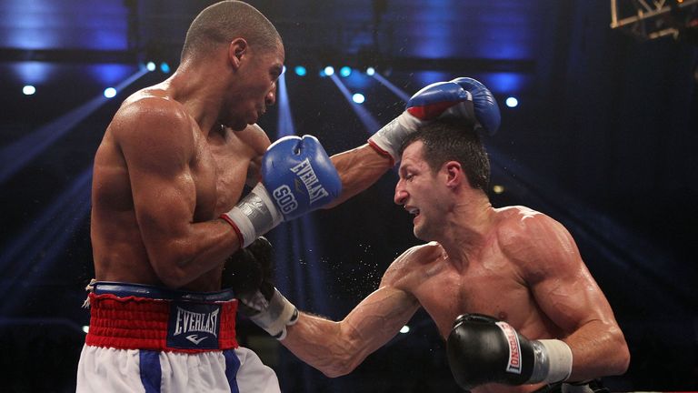 ATLANTIC CITY, NJ - DECEMBER 17:  Carl Froch of England lands a right on Andre Ward during their WBA/WBC Super Middleweight Championship bout at Boardwalk 