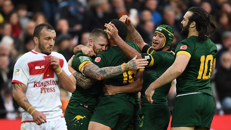 Josh Dugan of Australia celebrates with team mates after scoring a try during the Four Nations match between the England-Kangaroos