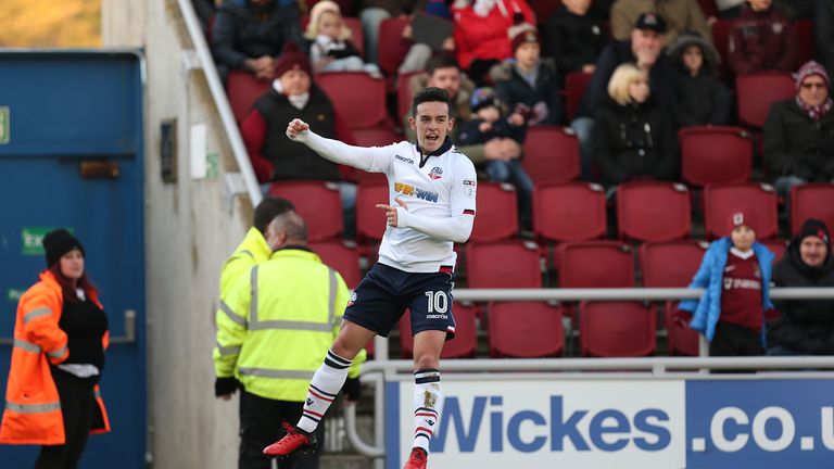 Zach Clough celebrates after netting Bolton's winner at Northampton