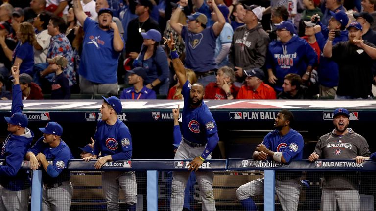 Chicago's players and fans celebrate after Anthony Rizzo hits a two-run home run during the final innings.