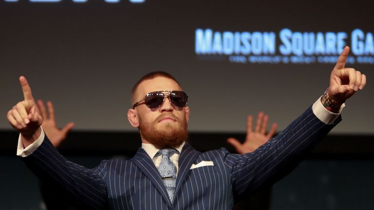 NEW YORK, NY - SEPTEMBER 27:  Conor McGregor gestures to the crowd during the UFC 205 press conference at The Theater at Madison Square Garden on September