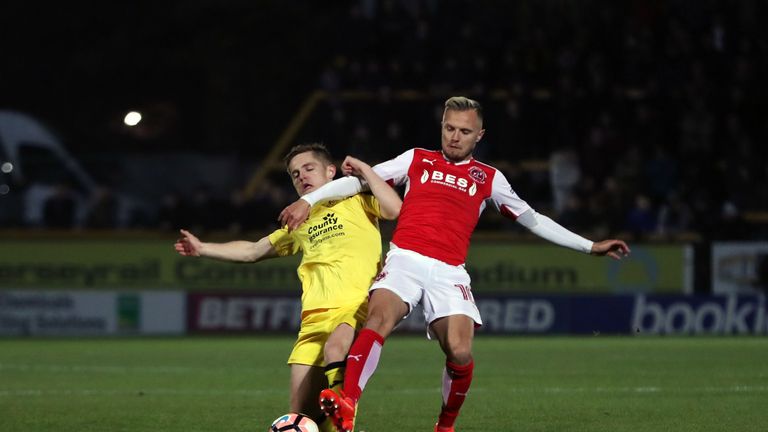 Fleetwood Town's David Ball is put under pressure