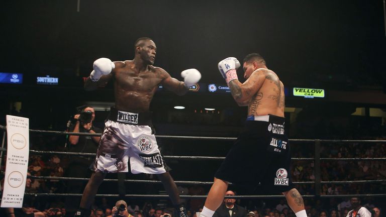 BIRMINGHAM, AL - JULY 16:  WBC World Heavyweight Champion Deontay Wilder (L) fights Chris Arreola (R) in a title defense at Legacy Arena at the BJCC on Jul
