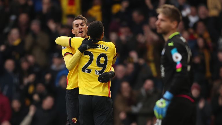 Watford's scorers Etienne Capoue and Roberto Pereyra embrace during their 2-1 win over Leicester