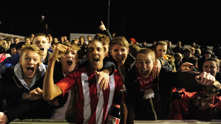 Brackley celebrate victory over Gillingham in the FA Cup back in 2013