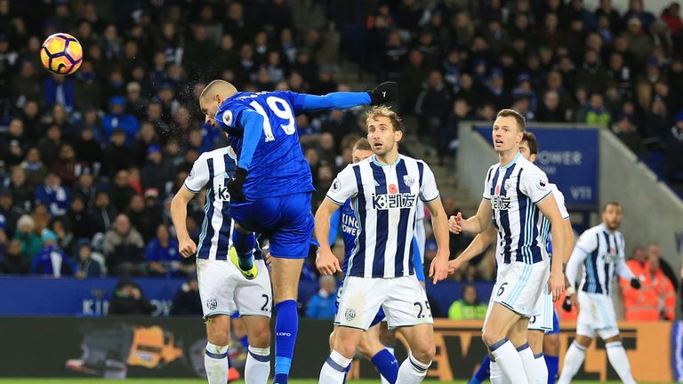 Leicester City's Islam Slimani (left) scores his team's first goal of the game during the Premier League match v West Brom at the King Power Stadium