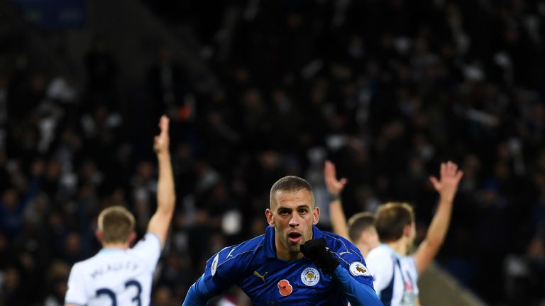 Islam Slimani of Leicester City celebrates scoring his side's first goal during the Premier League match v West Brom