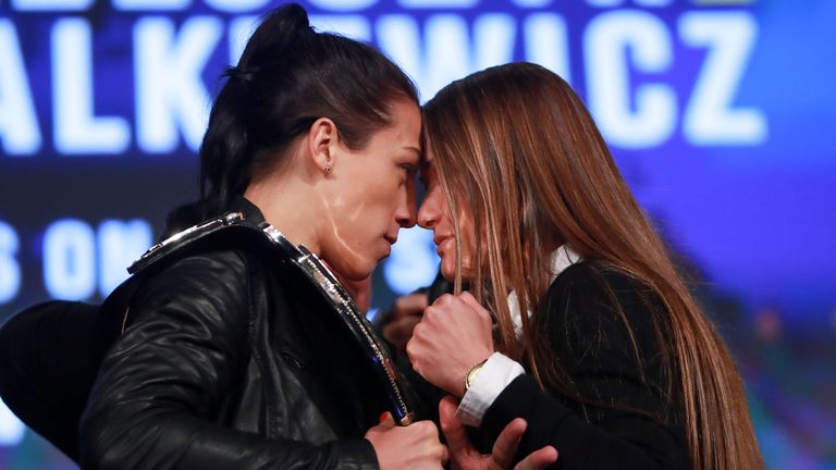 NEW YORK, NY - SEPTEMBER 27:  Joanna Jedrzejczyk (L) faces off with Karolina Kowalkiewicz (R) during the UFC 205 press conference at The Theater at Madison