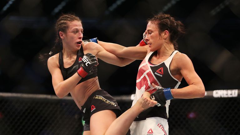 MELBOURNE, AUSTRALIA - NOVEMBER 15:  Joanna Jedrzejczyk of Poland (L) and Valerie Letourneau of Canada compete in their UFC women's strawweight championshi