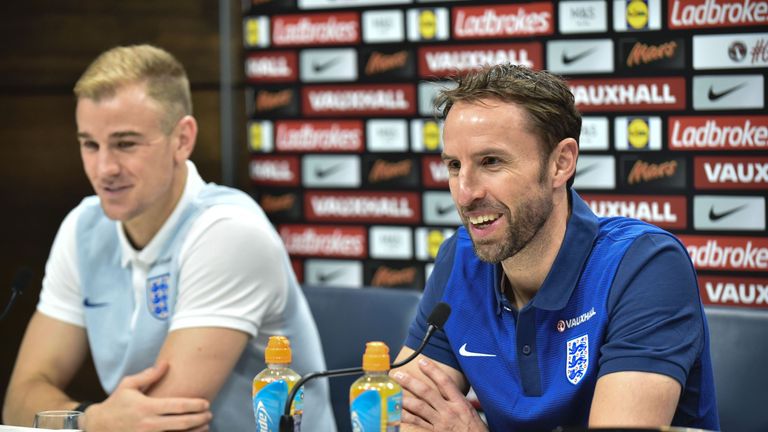 England goalkeeper Joe Hart, interim manager Gareth Southgate take part in a press conference at Tottenham Hotspur's training ground