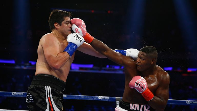 NEW YORK, NY - OCTOBER 17:  Luis Ortiz punches Matias Ariel Vidondo during their WBA Interim Heavyweight title fight at Madison Square Garden on October 17