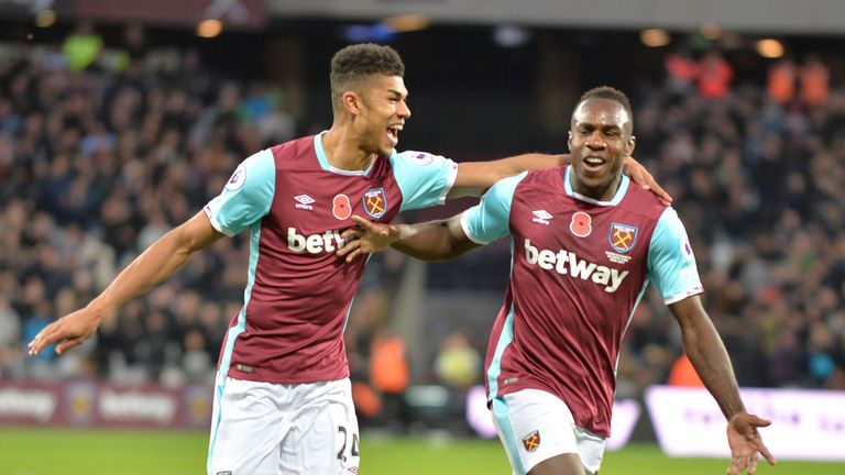 Michail Antonio (R) celebrates with Ashley Fletcher after scoring the opening goal in West Ham v Stoke, Premier League