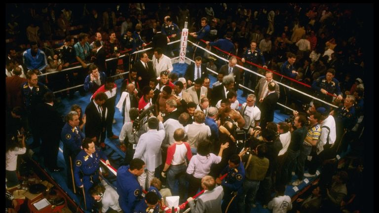 22 Nov 1986:  Trevor Berbick loses to Mike Tyson in the second of the twelve rounds at the Las Vegas Hilton in Las Vegas, Nevada. Tyson won the WBC World H