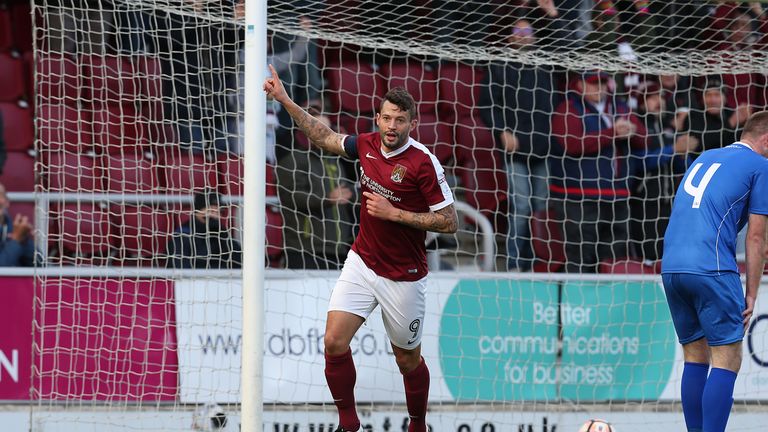 Marc Richards celebrates after scoring Northampton's second goal