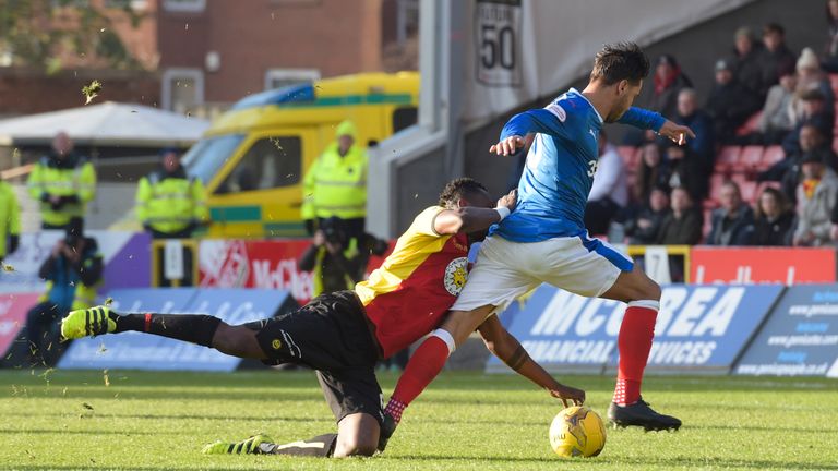 Harry Forrester and Abdul Osman battle for the ball at Saturday lunchtime
