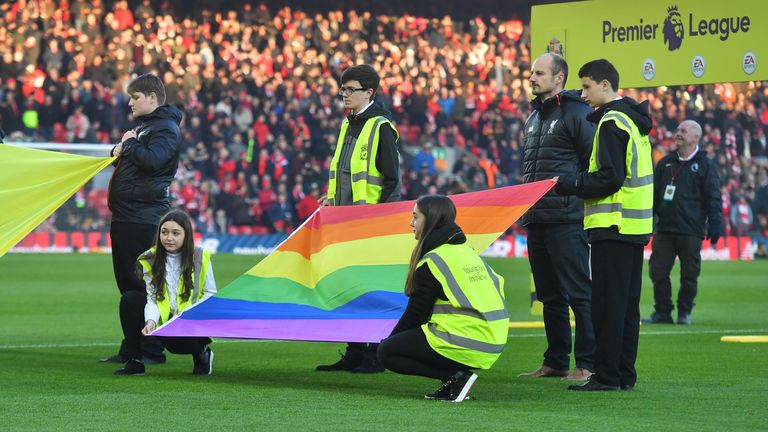 A rainbow flag is presented on the pitch before the Premier League match v Sunderland at Anfield, Liverpool, as part of the Rainbow Laces campaign