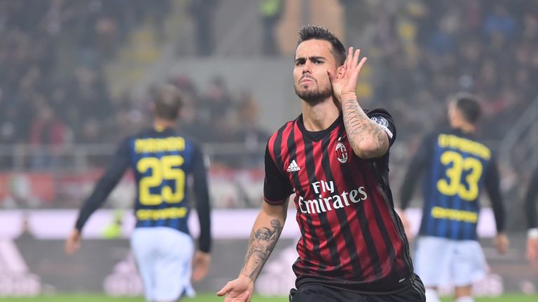 AC Milan's forward from Spain Suso celebrates after scoring during the Italian Serie A football match AC Milan Vs Inter Milan on November 20, 2016 at the '