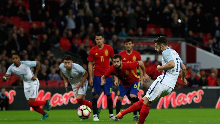LONDON, ENGLAND - NOVEMBER 15:  Adam Lallana of England scores the opening goal of the game from the penalty spot during the international friendly match b