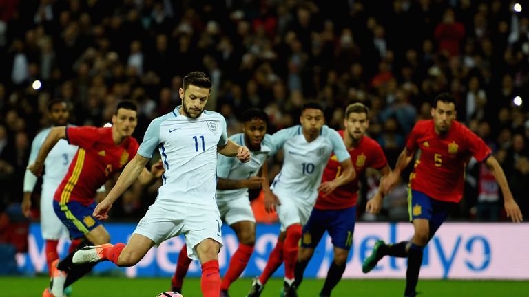 Adam Lallana of England scores the opening goal of the game